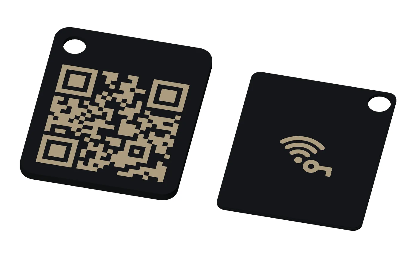 A base tag, khaki on black: both pieces, the front and the back.