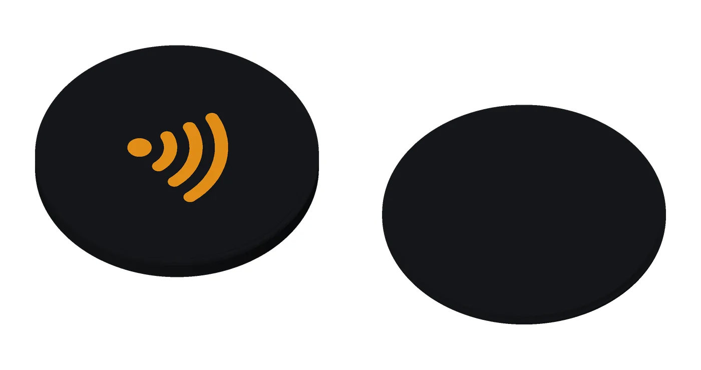 An earless Base coin, orange on black: no ring hole, for a stand or a home project.