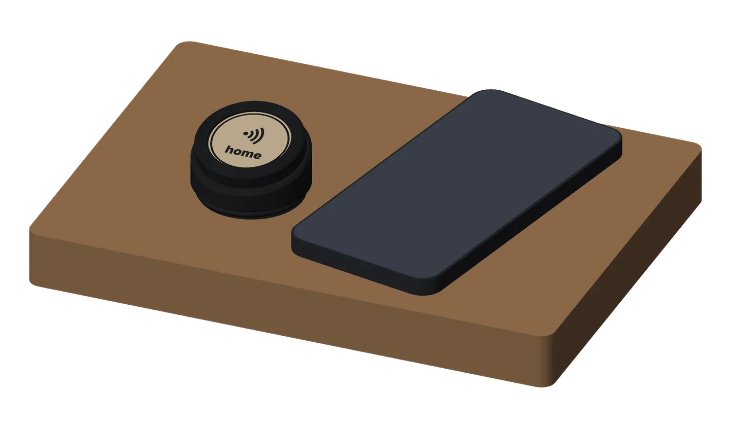The Stand Mini on an oak desk beside a phone: a small black stand holding a khaki Premium coin with tap waves and the word home, its face tilted toward you.